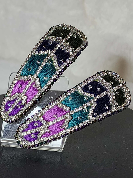 Pair of Feather Snap Barrettes